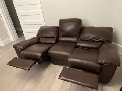 As good as new Natuzzi Leather couch with recliners, View more