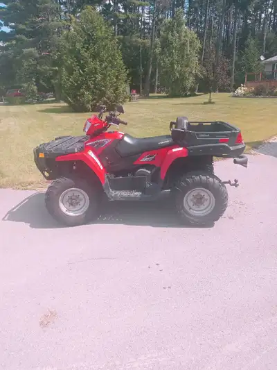 2009 Polaris 800 X2 in excellent condition. Built in 2 up seat, dump box, front storage compartment....