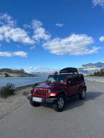Please read the bottom for contact information! Selling my cherry red 2012 Jeep Wrangler Unlimited S...