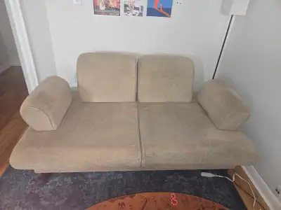 Older couch for sale – priced low because it’s well loved. • Arm and back rests are removable • Fram...