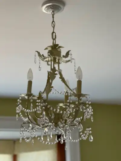 Pale green chandelier. Very good condition. 16W x 20H, 7 inch chain from ceiling to top of light. Re...