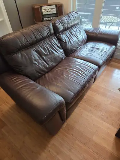 Leather electronic reclining sofa, View more