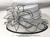 Brand new Beautiful feather fascinator hair clip band On Sale