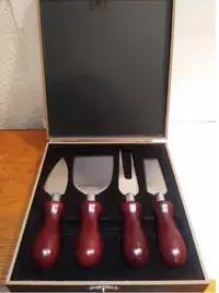 Bienne Four Peice Redwood Cheese Knife Set. 