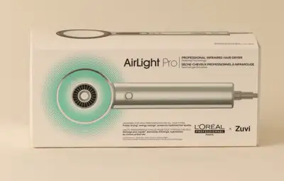 Introducing the L'Oreal Airlight Pro professional infrared hair dryer, featuring patented technology...