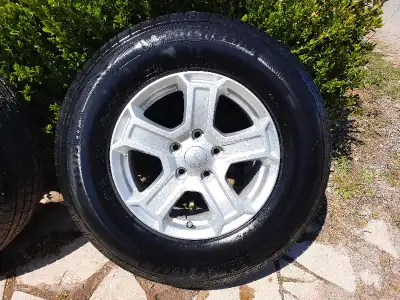 Essentially new set of factory tires and rims with TPMS. To buy new would be three times asking pric...