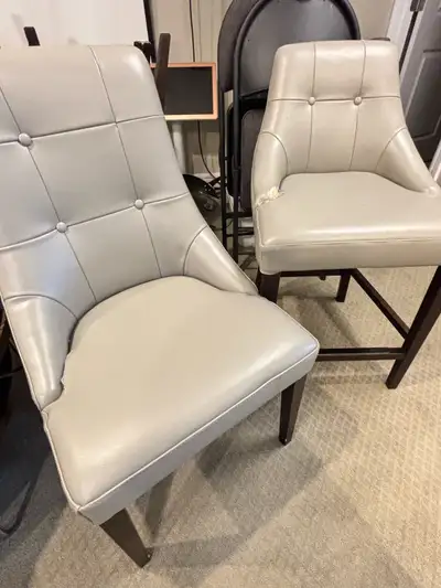 High-end custom leather dining chairs – 3 brown, 2 grey. Originally $400 each, now $5 each (minor cr...