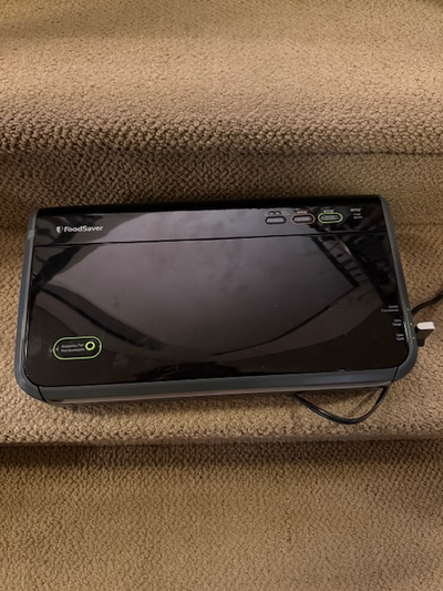 I have for sale a FoodSaver Vacuum Sealer. Model FM2100 - Dry/Moist Settings - Vacuum & Seal Button...