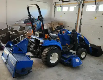 Comes with Loader, 50" Tiller, 60" Mower, original owner, 4 wheel drive, automatic transmission, rol...