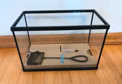 Never used, measures 16"L x 8" W x 10" H, comes with fish net and floating thermometer only. Firm on...