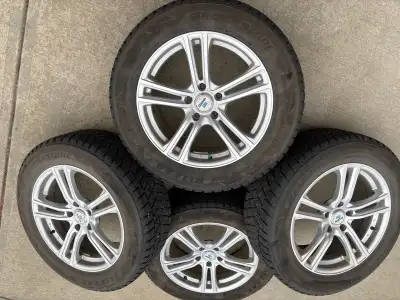 4 Winter tires BLIZZAK BRIDGESTONE ..235/60 R18 c/w silver chrome mags, pressure sensors. Wall stora...