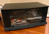 TV Stand with Glass Doors and Casters (Black)