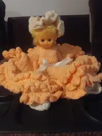 Dresser  doll with orange dress