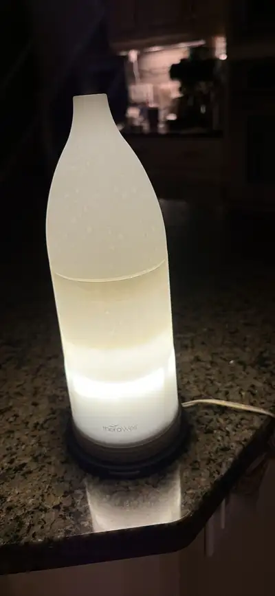 Scent diffuser with light Please note it’s missing the decorative ring on bottom. Otherwise diffuser...