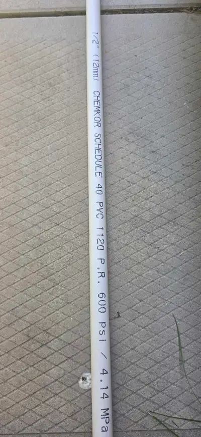 This is a single length 10 feet long of CHEMKOR 1/2 inch Schedule 40 PVC pipe, measuring 12mm in dia...