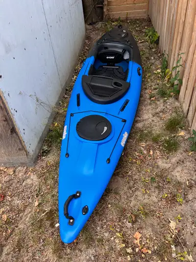 Evoke Algonquin 12ft sit-in fishing kayak, features a comfortable seat, ample storage, and a stable...