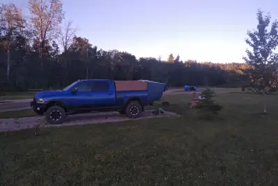 Ram 6.5 Softopper, Tan. Includes all accessories. Mesh rear window, Pop Up tent, Protective cover/ba...
