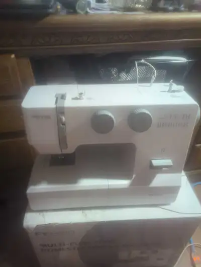 sewing machine, View more