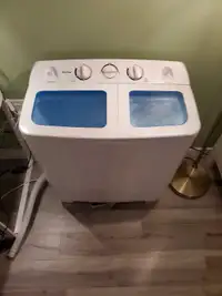 Used twin portable washer.