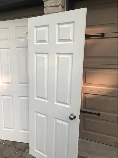 Two doors 30x 76 30 by 79 With hinges and door knobs In addition 2 sliding doors with hardware. All...