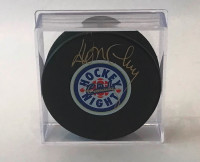 Signed Don Cherry puck with COA