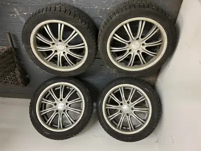 4 17 inch wheels and 4 X 224/45R17 winter tires originally on a 2010 BMW 328i all in good condition.