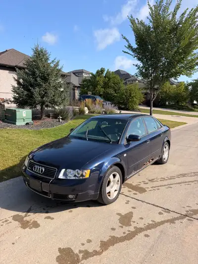 2004 Audi A4 Quattro (AWD), paired with the rare 6 speed manual transmission and even more low milea...