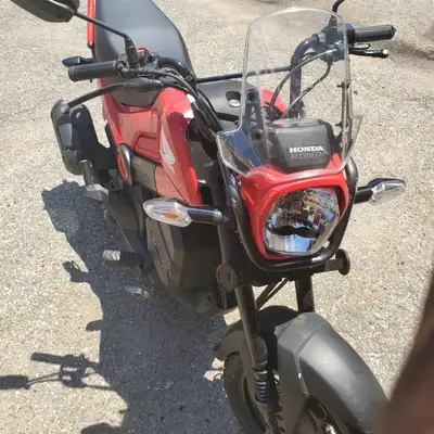 This pre-owned 2023 Honda Navi features a reliable 109cc engine and an easy-to-use automatic CVT tra...