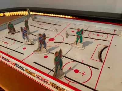 1968 vintage, mechanical game featuring 2D player figures on a tin surface. Missing 2 players and go...