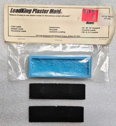 HO 34' COAL LOAD PRODUCTS ITEMS ARE IN NEW CONDITION 3 ITEMS AVAILABLE INCLUDING; 1 LOADKING PLASTER...