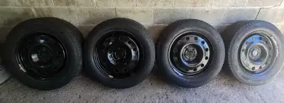 Low Kms, Set Of 4 Michelin Winter Tires 235/60/18 On Clean 5x108 Steel Rims. Lots Of Tread And Even...