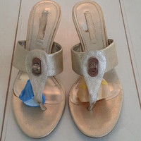 Metallic gold Nine West thong heeled sandals Size 7.5