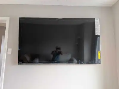 Ultra HD Google Tv, just 4 months old. Move out sale. Original box available. Wall mounting included...