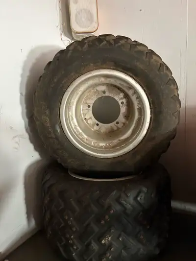 These are used Dunlop KT867 Sport 22x11-8 rear wheels that came off a 1992 Suzuki Lt250R. They are i...