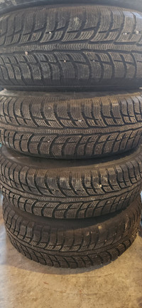 Like new 215/75R15 Winter tires on wheels (4)
