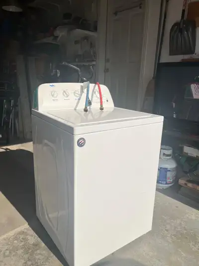 Selling a washing machine for $600 brand is Inglia., View more