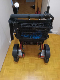 Powered folding wheelchair 