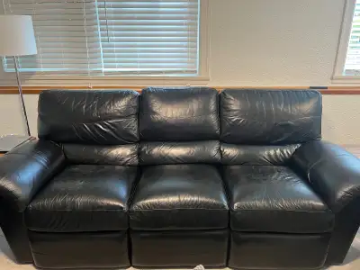 Black leather reclining sofa, View more