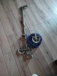 élevateur de corde à linge avec poulies de métal à roulement
