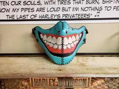Gumster, 100% leather biker mask. The color shifting blue and red is nuts in the sun! New upgraded s...