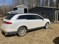 2011 Lincoln MKT to trade for a golf cart.