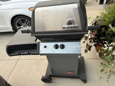 Used bbq. Grates starting to rust a bit. Always been covered. In good shape. $100