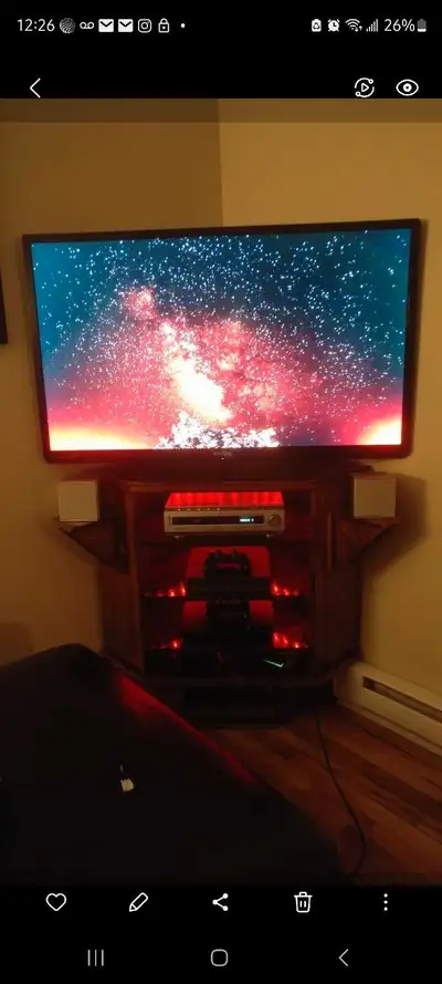 I designed and built this media unit specifically to fit in the corner of a room to fit a 47 inch te...