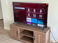 TV + Tv Stand for sale ( 3 weeks of use)