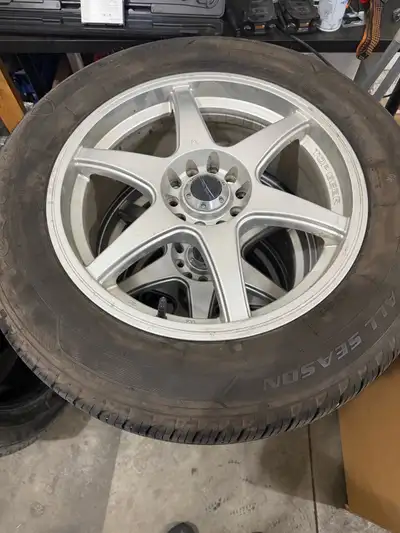 Set of four rims and tires 17 inch wheel Dual bolt pattern 5x100 and 5x114.3 225/60r17 tires 2 tires...