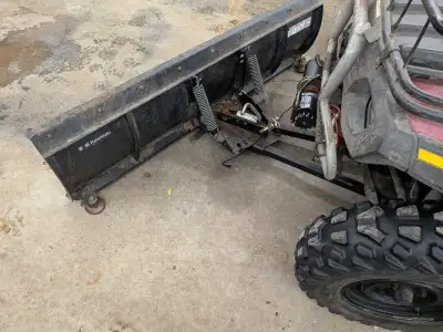 60 inch Kawasaki plow in good shape. ( Dirty in pics ) Swivels side to side . Home made bracket bolt...