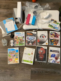 Nintendo Wii with controllers, games, Wii fit board 