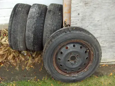 set off 4 175/65/14 winter tires on 4x4.25x14 rims 180.00 call807- 708-4178