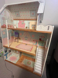 Large doll house with dolls and accessories