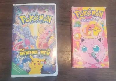 Pokemon Jigglypuff Pop and Pokemon The First Movie with Pikachu's Vacation on VHS. Cases have dents,...